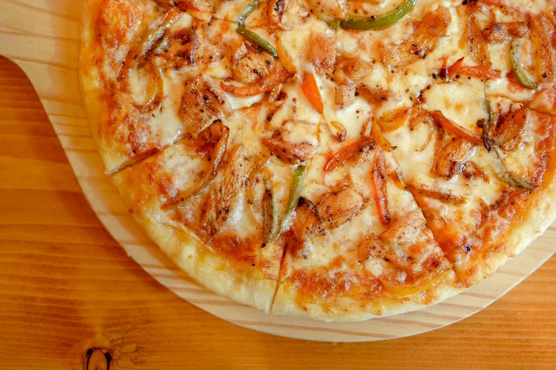 BBQ chicken pizza with caramelized onions