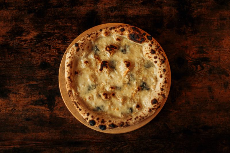 Four cheese pizza with truffle oil