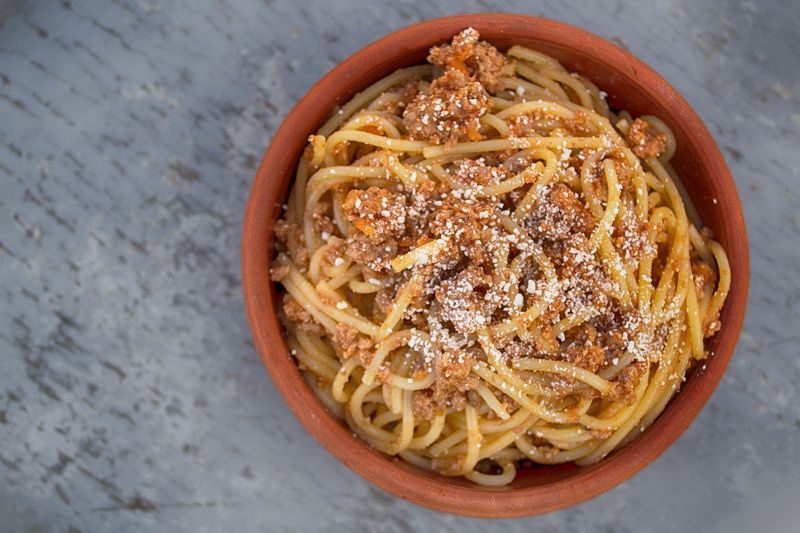Spaghetti bolognese with meat sauce and parmesan